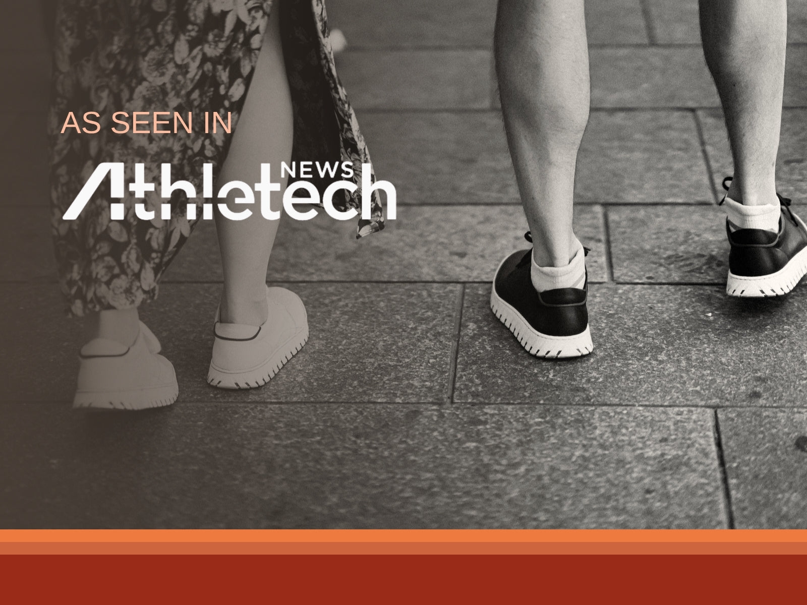 Two people walking in white and black IAMBIC precision-fit shoes