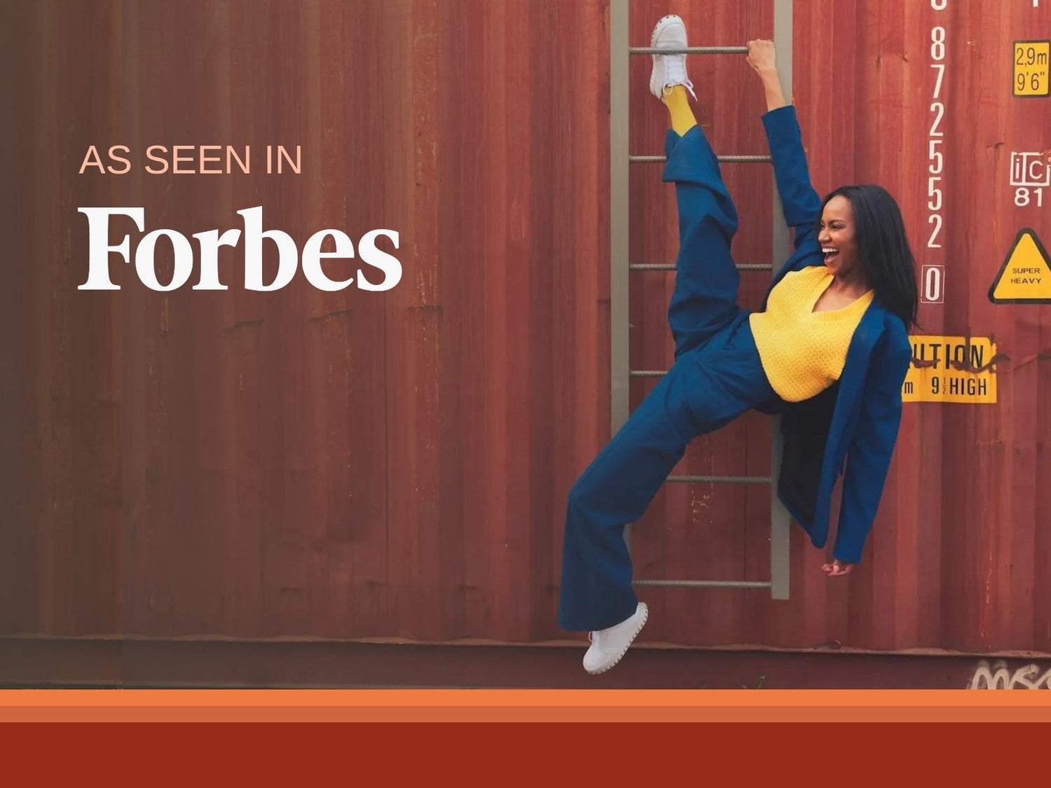 A woman mid-kick against a shipping container in white IAMBIC precision-fit shoes
