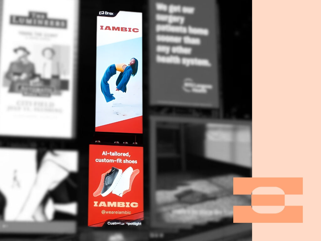 IAMBIC digital billboard in Times Square during Fashion Week showcasing AI-tailored, custom-fit shoes.
