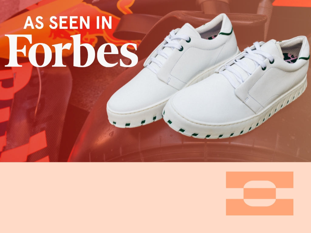 IAMBIC MODEL T custom-fit white leather sneakers featured in Forbes, showcasing AI-tailored design and precision-fit craftsmanship.
