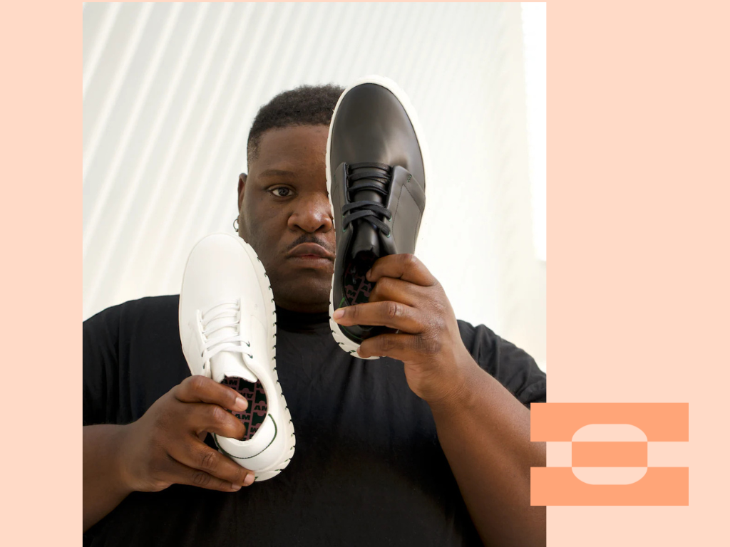 Fashion stylist on set wearing IAMBIC MODEL T in white; wide-forefoot, AI-tailored, custom-fit shoes.