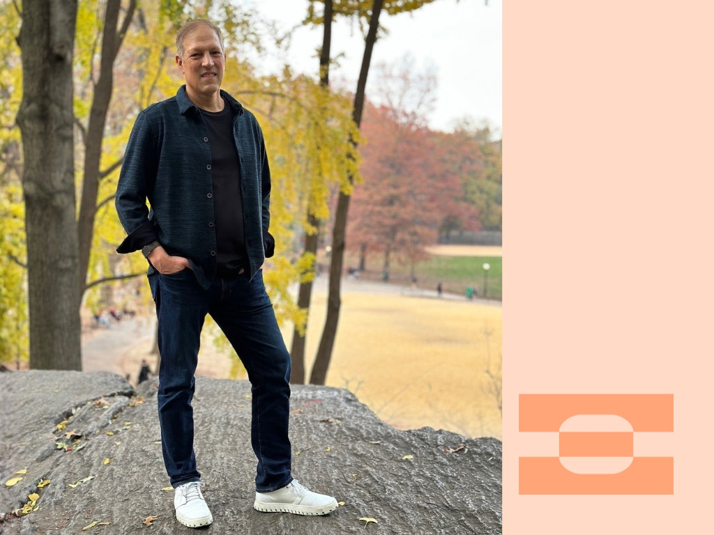 Professional wearing IAMBIC MODEL T precision-fit shoes in Central Park, showcasing comfort and style for modern executives.