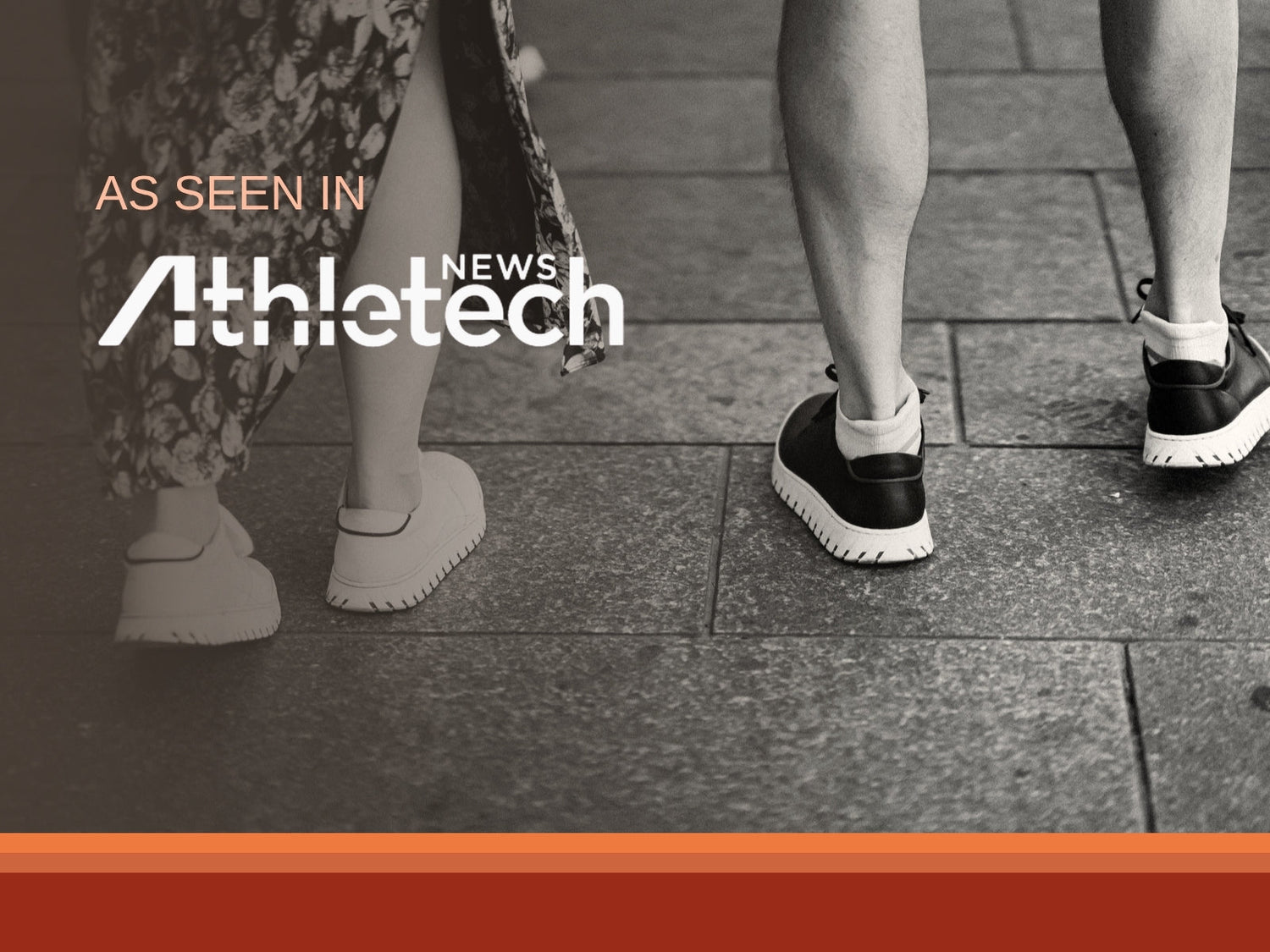Two people walking in white and black IAMBIC precision-fit shoes
